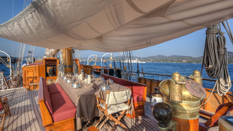 open dining area on a yacht for charter S/Y TRINAKRIA