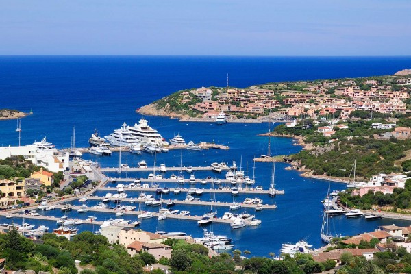 Superyachts berthed on luxury yacht charter italy