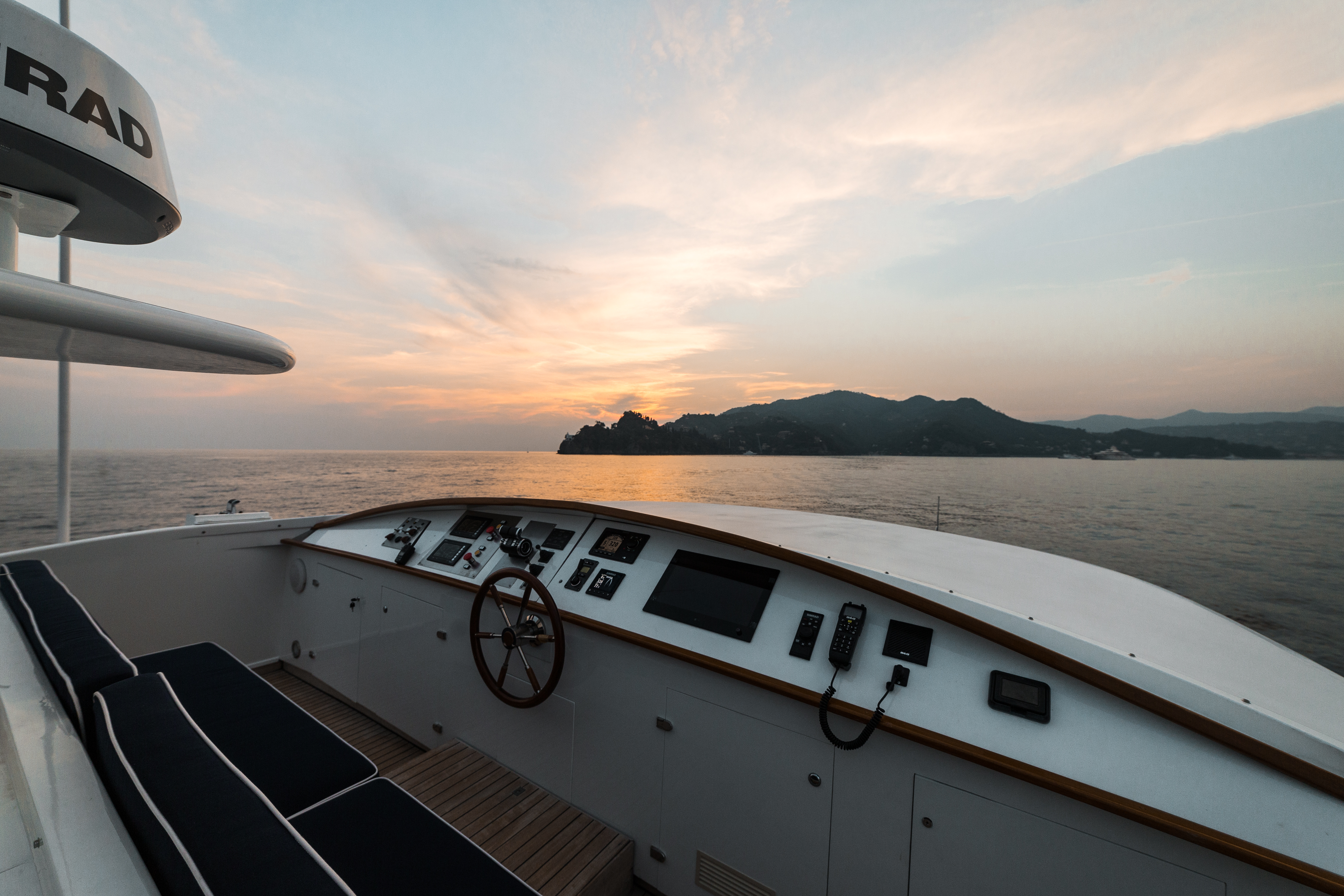 M/Y PAOLUCCI for charter deck area at sunset