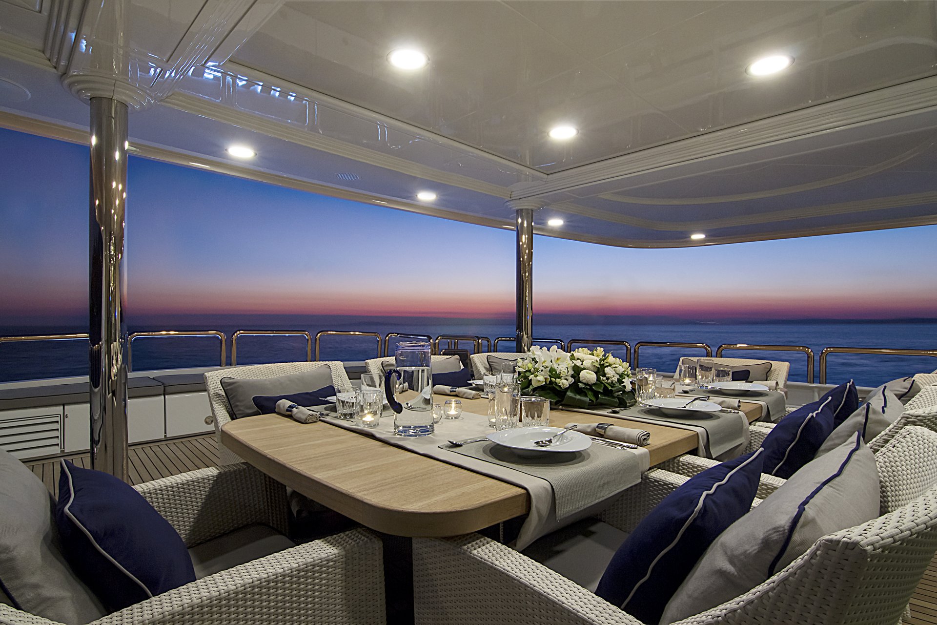 m/y invader yacht for charter sunset dinner