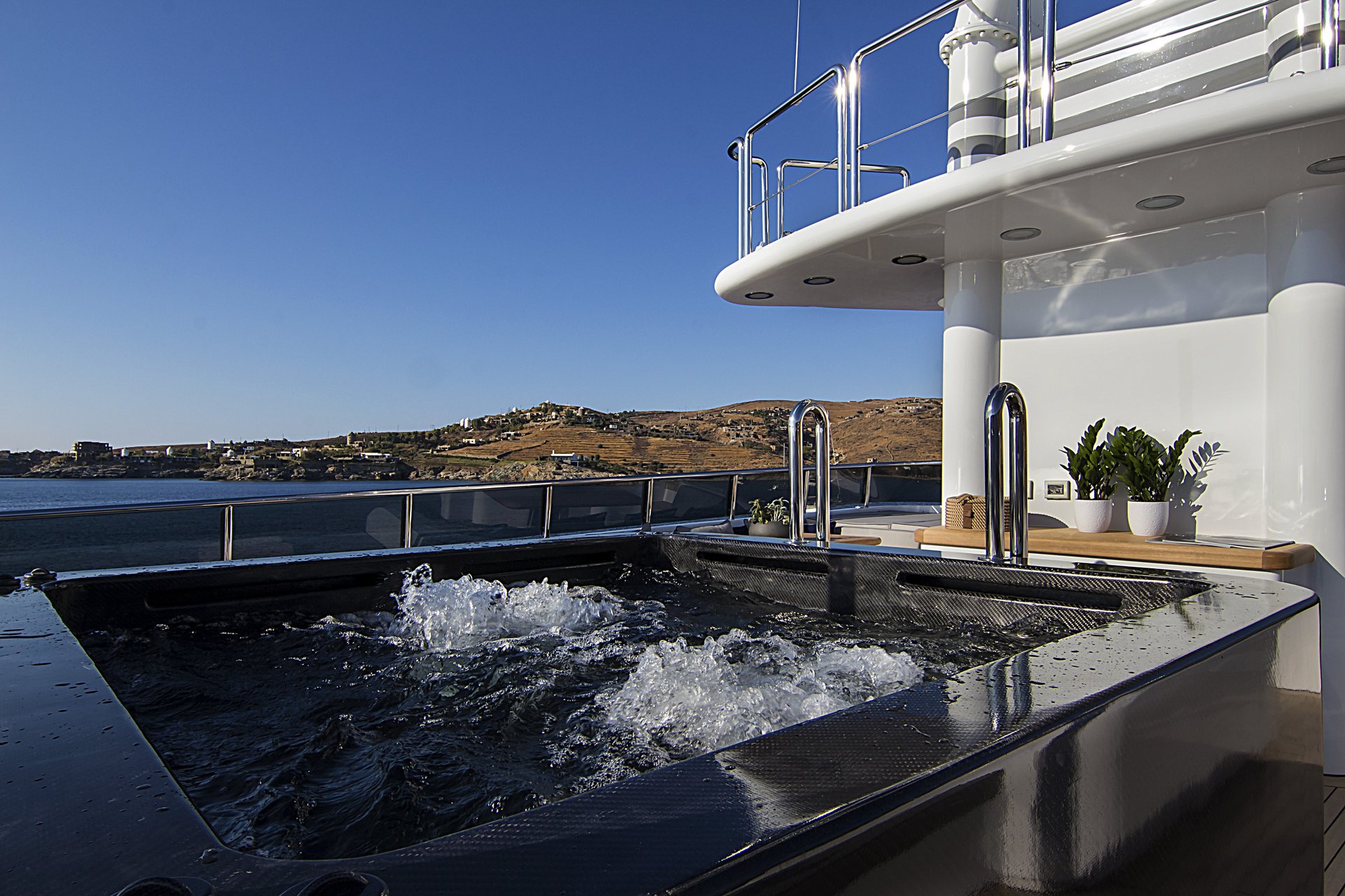 m/y invader yacht for charter hot tub