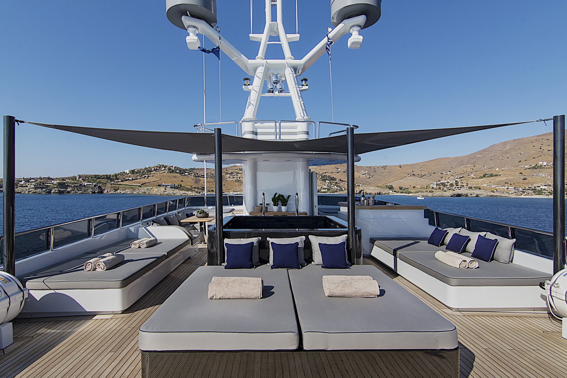 m/y invader yacht for charter deck lounging