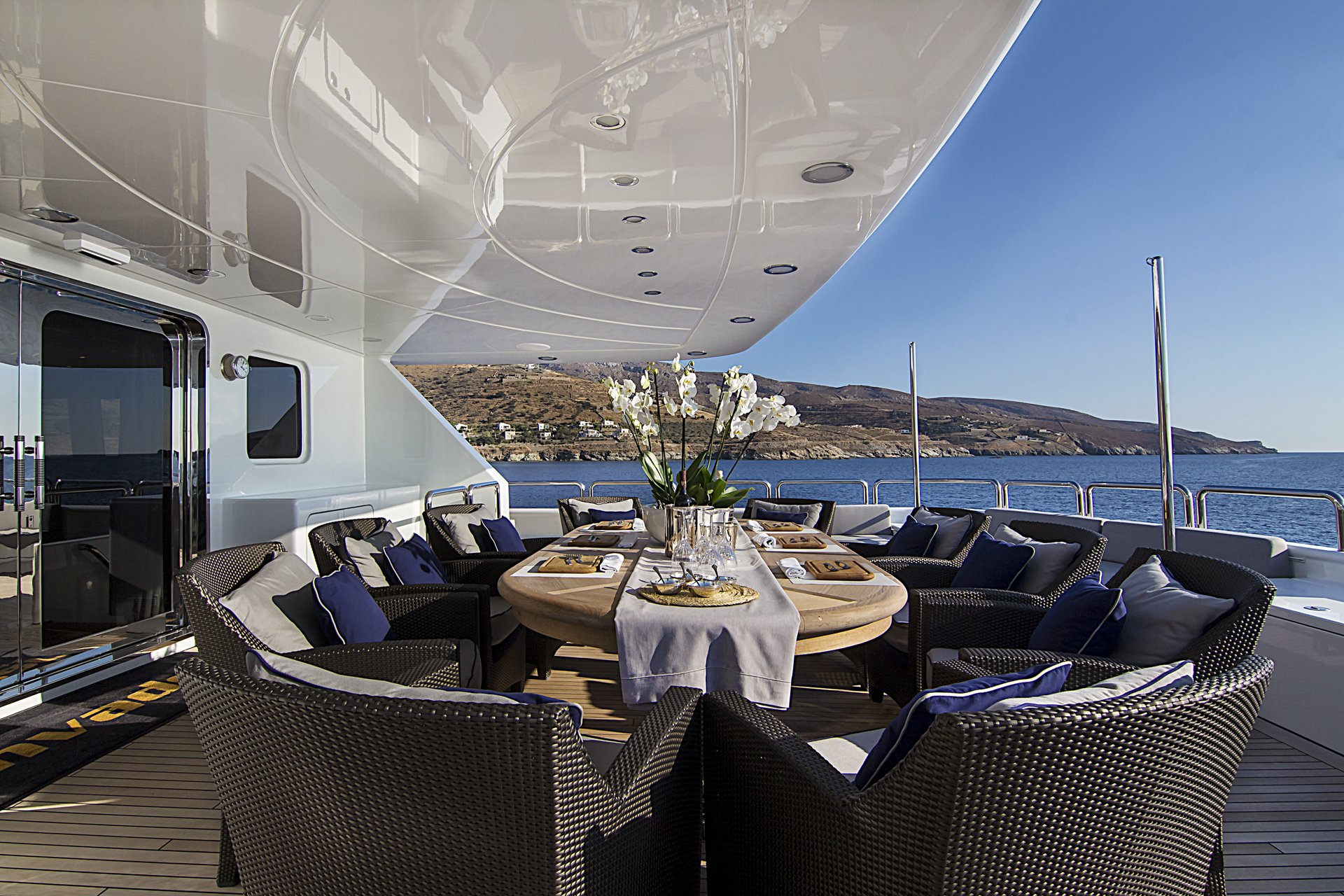 m/y invader yacht for charter outdoor set dining table