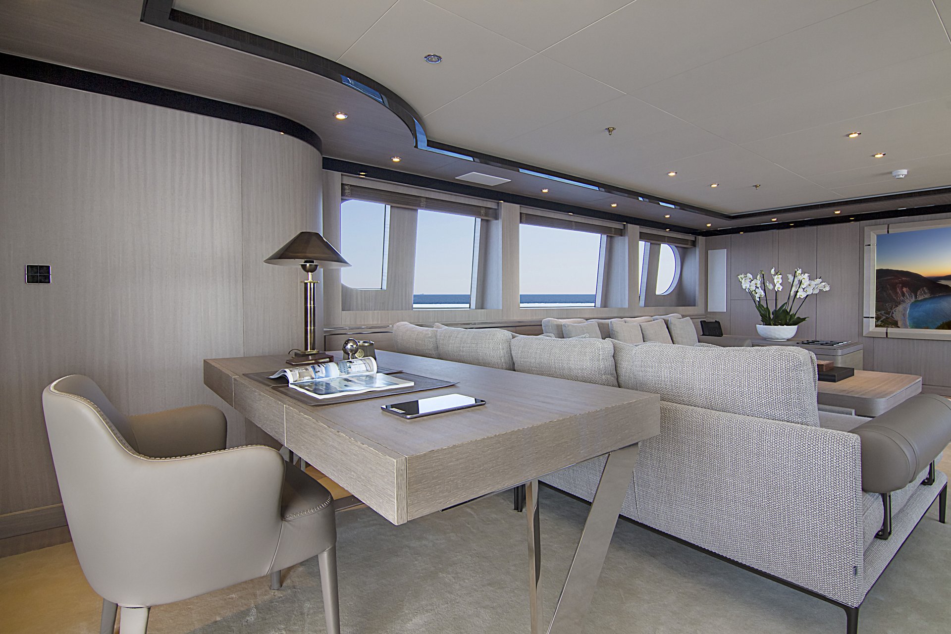 m/y invader yacht for charter lounge desk