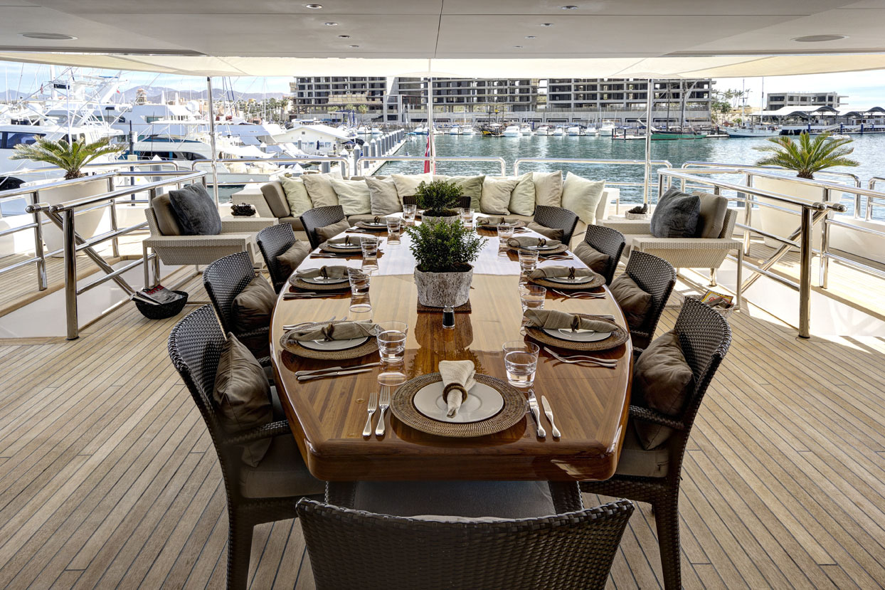 m/y azteca ii yacht for charter deck dining table