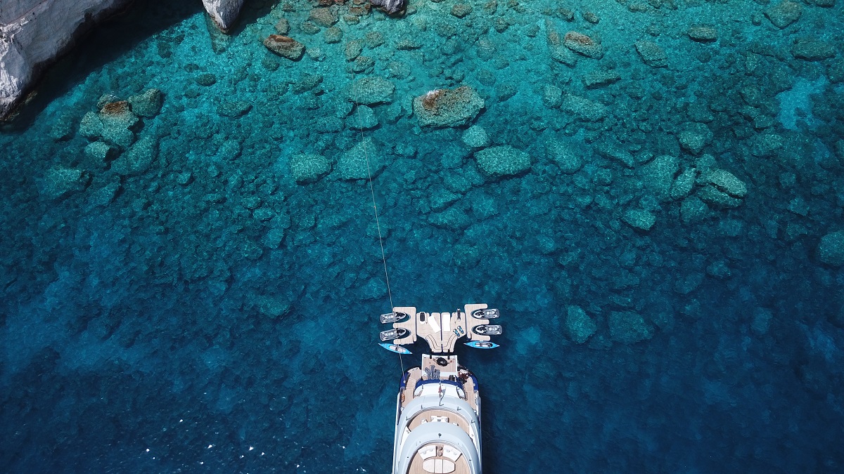 Drone view of After You with beach club and water toys yacht for charter Yachtzoo